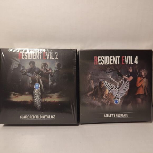 Resident Evil Claire Redfield & Ashley's Limited Edition Necklaces Official Set - Picture 1 of 8